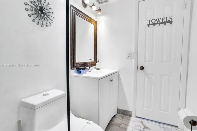 a view of a balcony with chairs