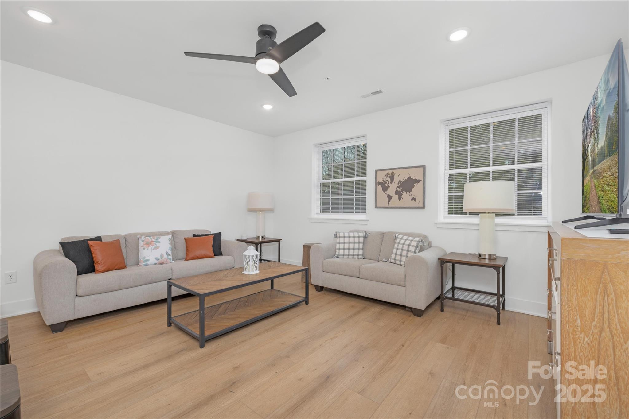 203 Grandin Road, Unit 2 Charlotte, NC 28208 - Photo 2 of 23 a living room with furniture and windows