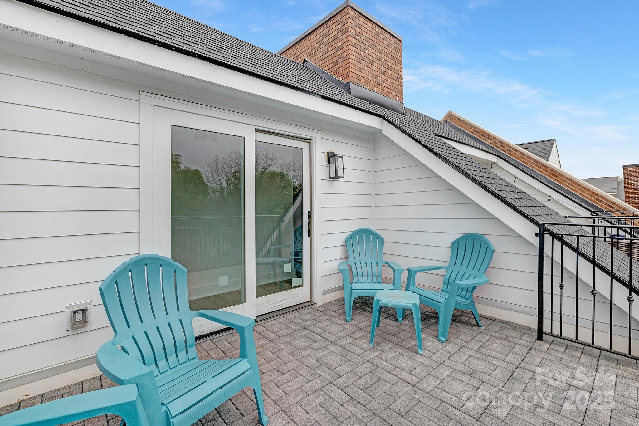 203 Grandin Road, Unit 2 Charlotte, NC 28208 - Photo 22 of 23 a view of two chairs in patio