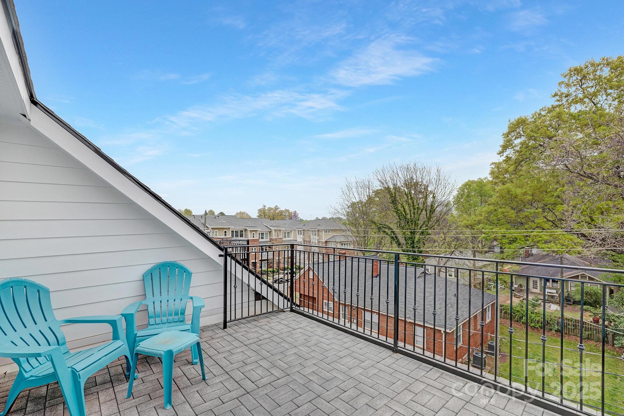 203 Grandin Road, Unit 2 Charlotte, NC 28208 - Photo 23 of 23 a view of a chair and table in the balcony