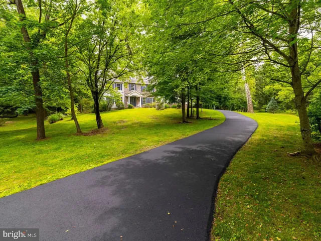 a view of a yard with swimming pool