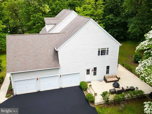 a view of a swimming pool with a yard