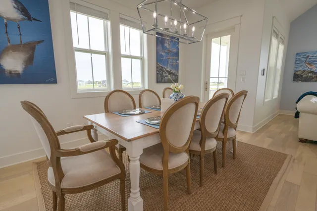 a kitchen with a stove a sink and a microwave