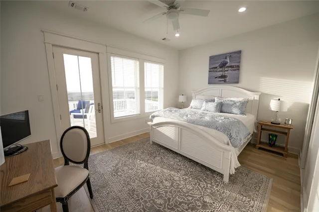 a view of a bedroom with a bed