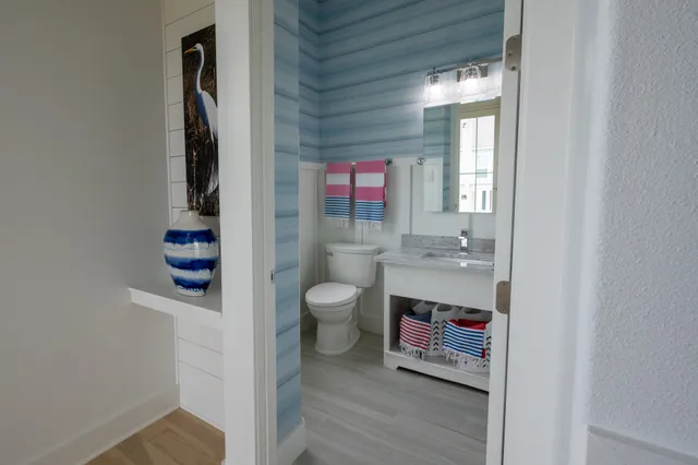 a view of staircase with white walls