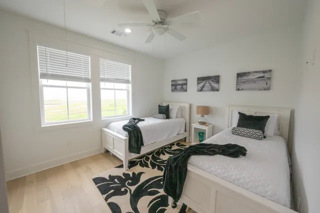 a bathroom with a sink toilet a shower and a mirror