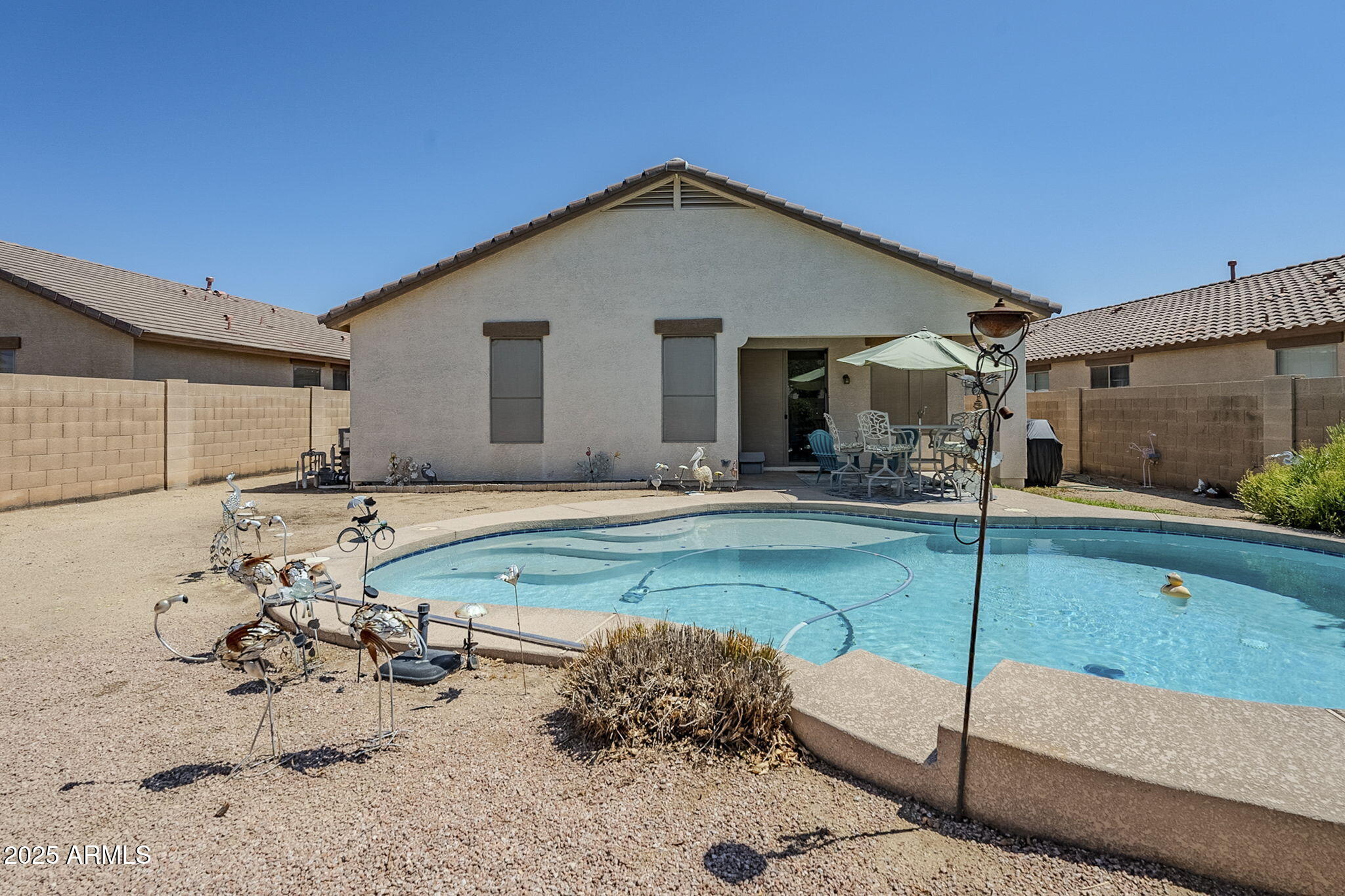 10233 West Cordes Road Tolleson, AZ 85353 - Photo 54 of 57 Play pool with waterfall and Baja step