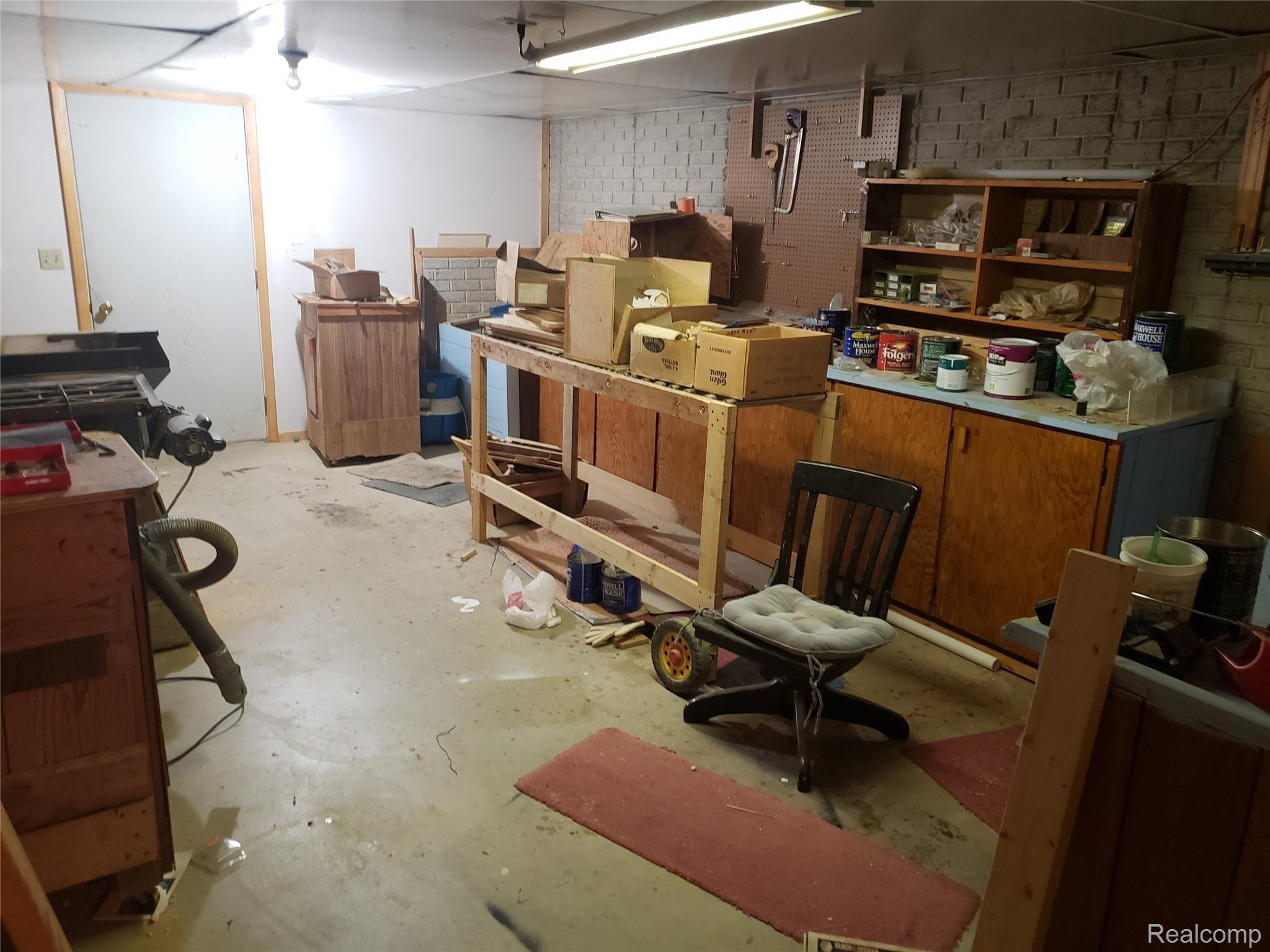 4552 Catlin Road Columbiaville, MI 48421 - Photo 24 of 41 Walk Out Basement Workshop