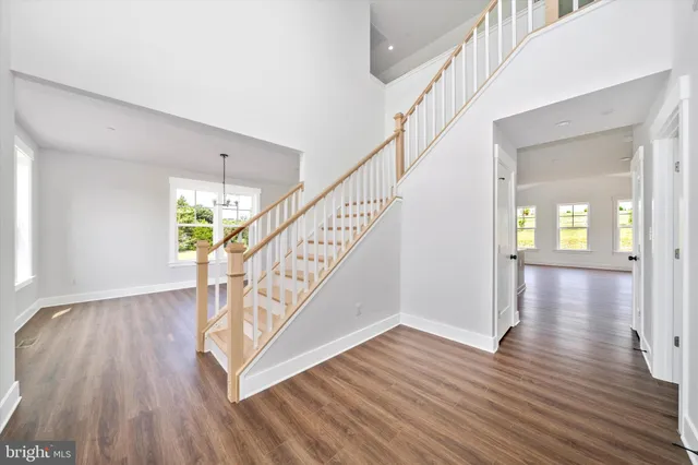 a view of entryway with wooden floor