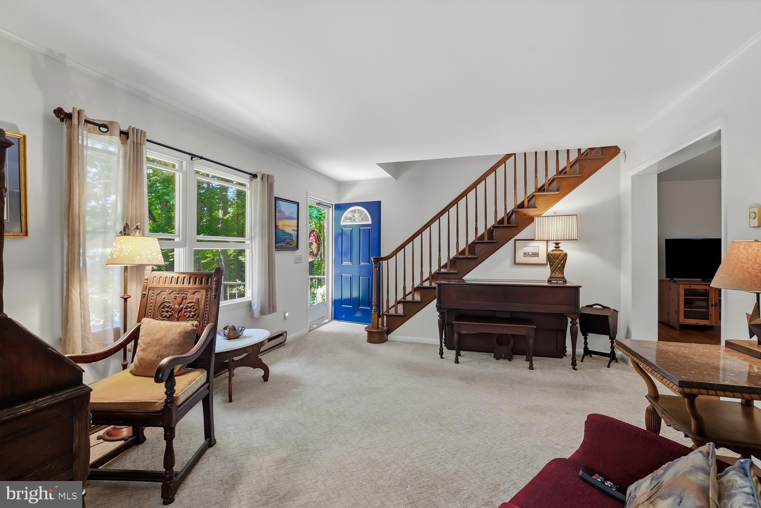 814 Wrights Neck Road Centreville, MD 21617 - Photo 28 of 53 a living room with furniture and a windows