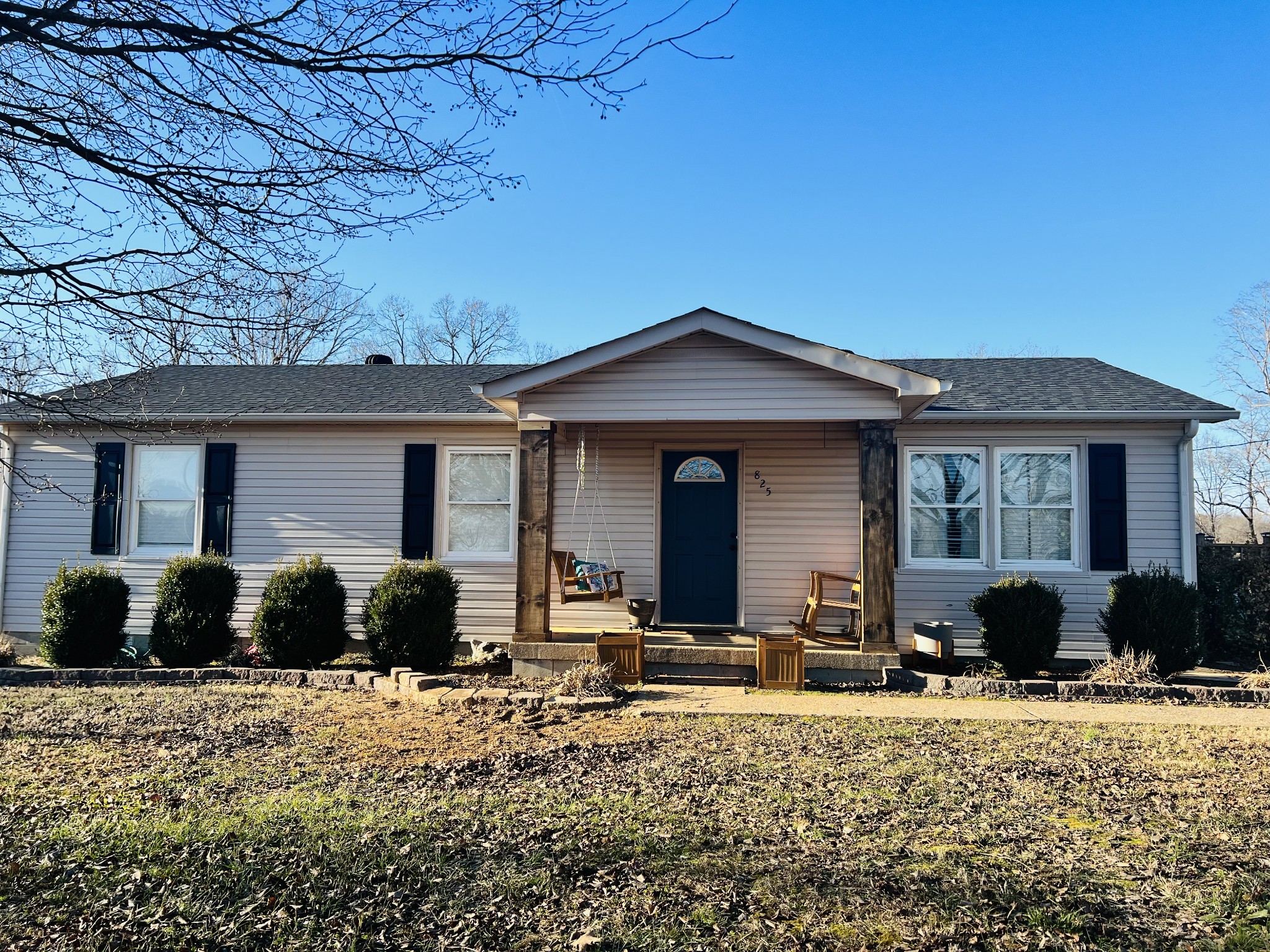 825 Moore Hollow Road Tennessee Ridge, TN 37178 - Photo 1 of 12 a front view of a house with a yard