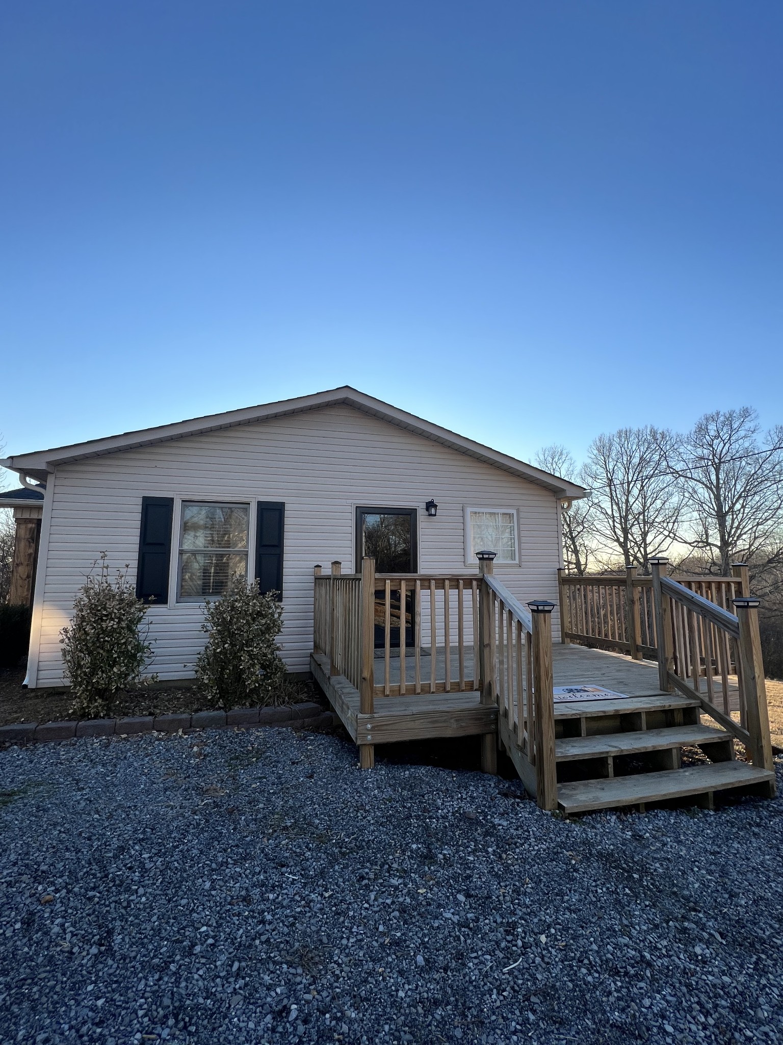 825 Moore Hollow Road Tennessee Ridge, TN 37178 - Photo 2 of 12 a view of backyard with wooden fence and large trees