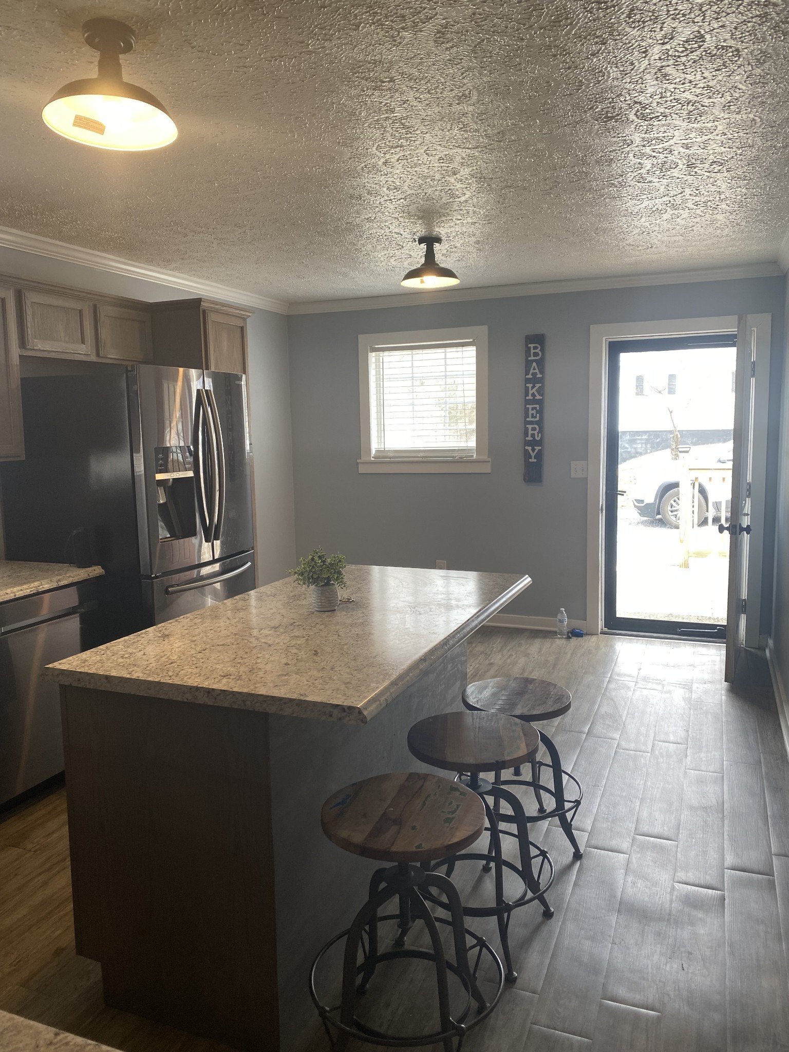 825 Moore Hollow Road Tennessee Ridge, TN 37178 - Photo 4 of 12 a kitchen with stainless steel appliances granite countertop a sink and a refrigerator