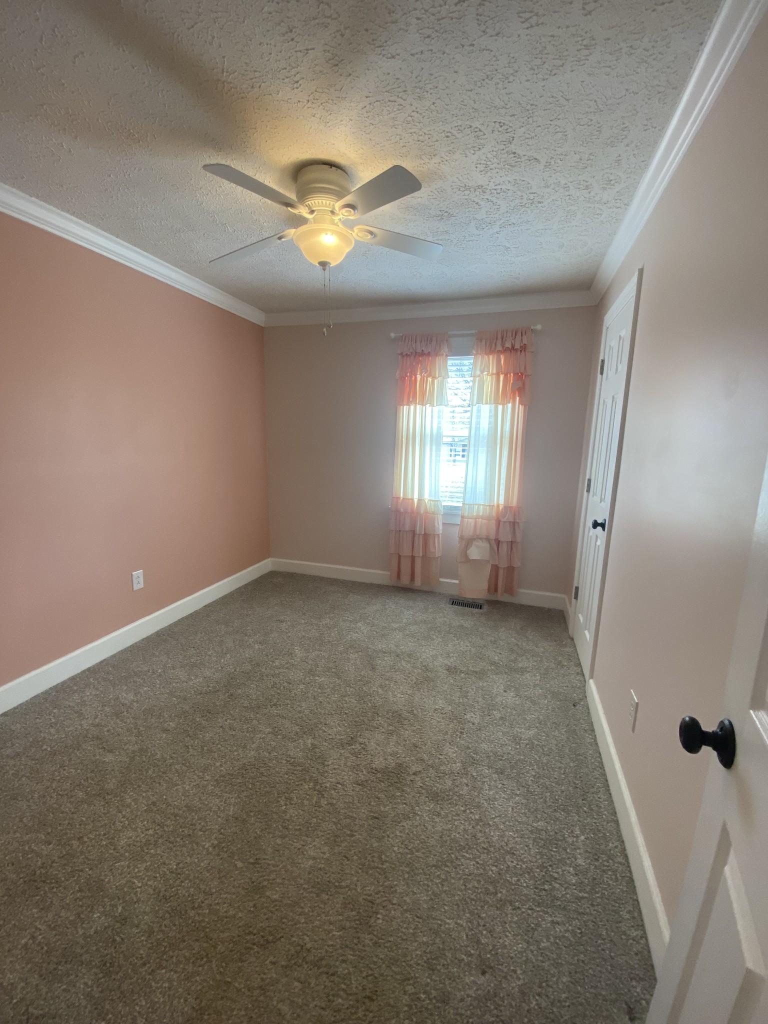 825 Moore Hollow Road Tennessee Ridge, TN 37178 - Photo 7 of 12 en empty room with windows and ceiling fan
