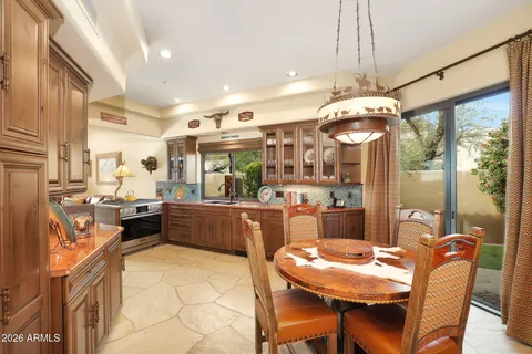 a view of a living room and kitchen