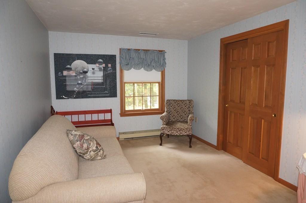 522 Leadmine Road Sturbridge, MA 01566 - Photo 19 of 33 a living room with furniture and a window