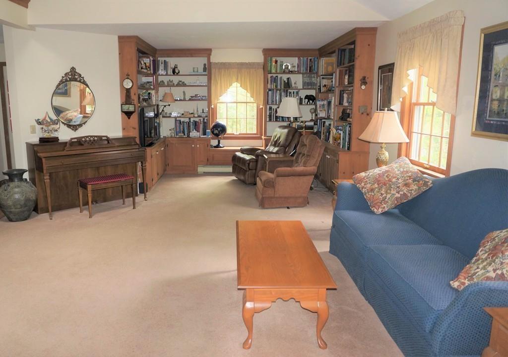 522 Leadmine Road Sturbridge, MA 01566 - Photo 9 of 33 a living room with furniture and a window