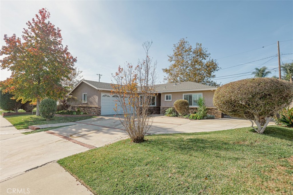 1402 North Parsons Place Santa Ana, CA 92703 - Photo 16 of 16 a front view of a house with a yard