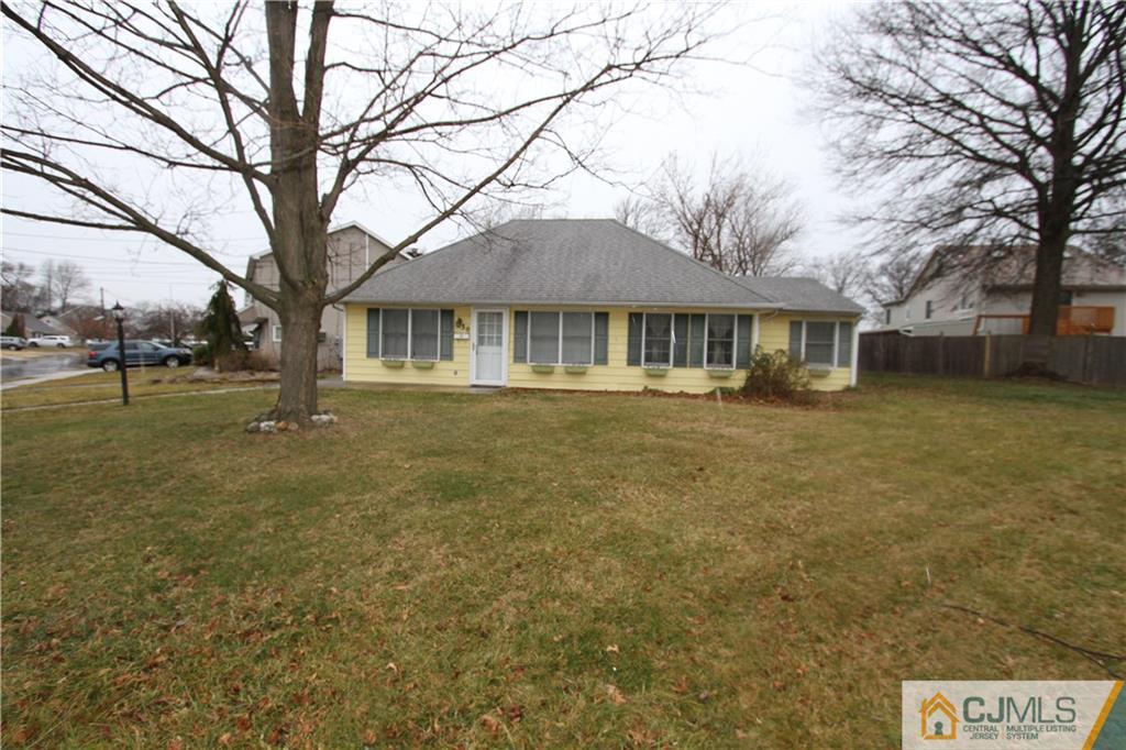 30 Brookville Road Edison, NJ 08817 - Photo 1 of 25 a front view of a house with a yard