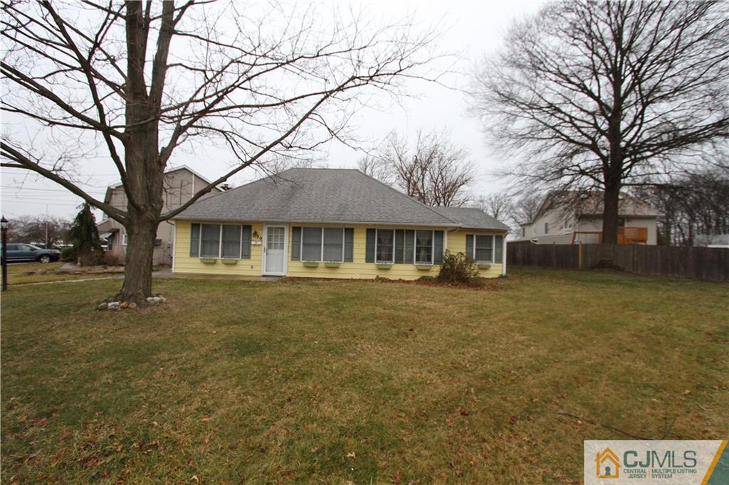 30 Brookville Road Edison, NJ 08817 - Photo 2 of 25 a front view of a house with a garden