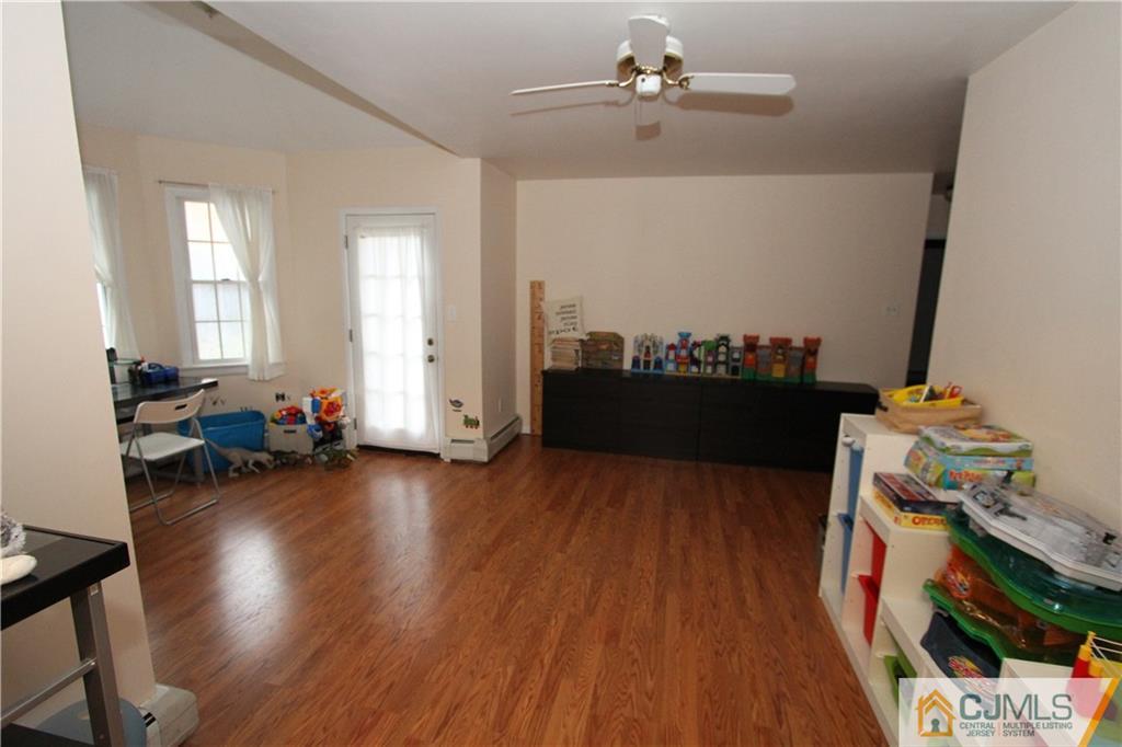 30 Brookville Road Edison, NJ 08817 - Photo 15 of 25 a view of a workspace with wooden floor and windows