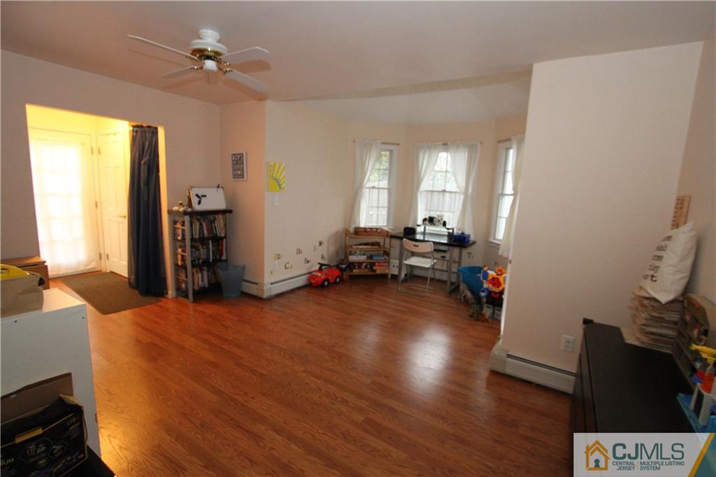 30 Brookville Road Edison, NJ 08817 - Photo 18 of 25 a view of a livingroom with furniture and a window