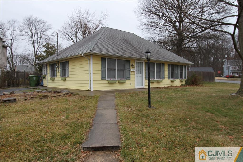 30 Brookville Road Edison, NJ 08817 - Photo 3 of 25 a front view of a house with garden