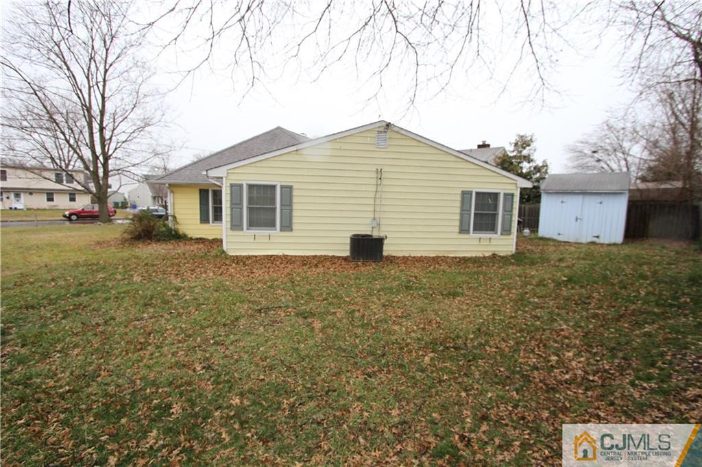 30 Brookville Road Edison, NJ 08817 - Photo 24 of 25 a view of a house with a yard