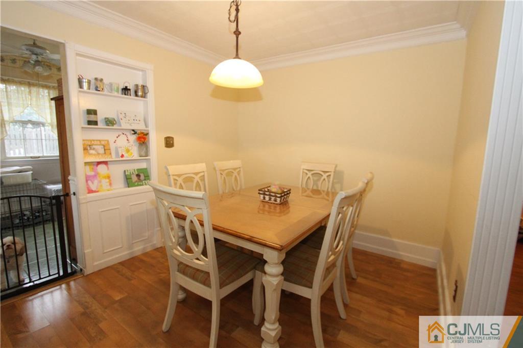 30 Brookville Road Edison, NJ 08817 - Photo 7 of 25 a view of a dining room with furniture and wooden floor