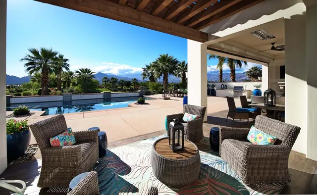 a view of a patio with swimming pool