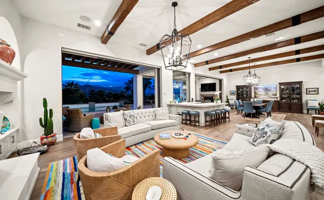 a front view of a house with a yard and a garage