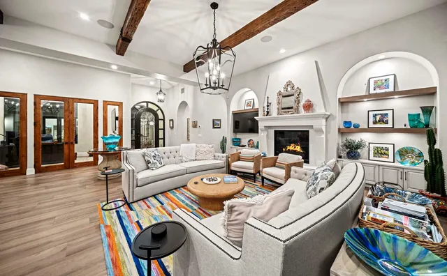a bathroom with a double vanity sink mirror and shower
