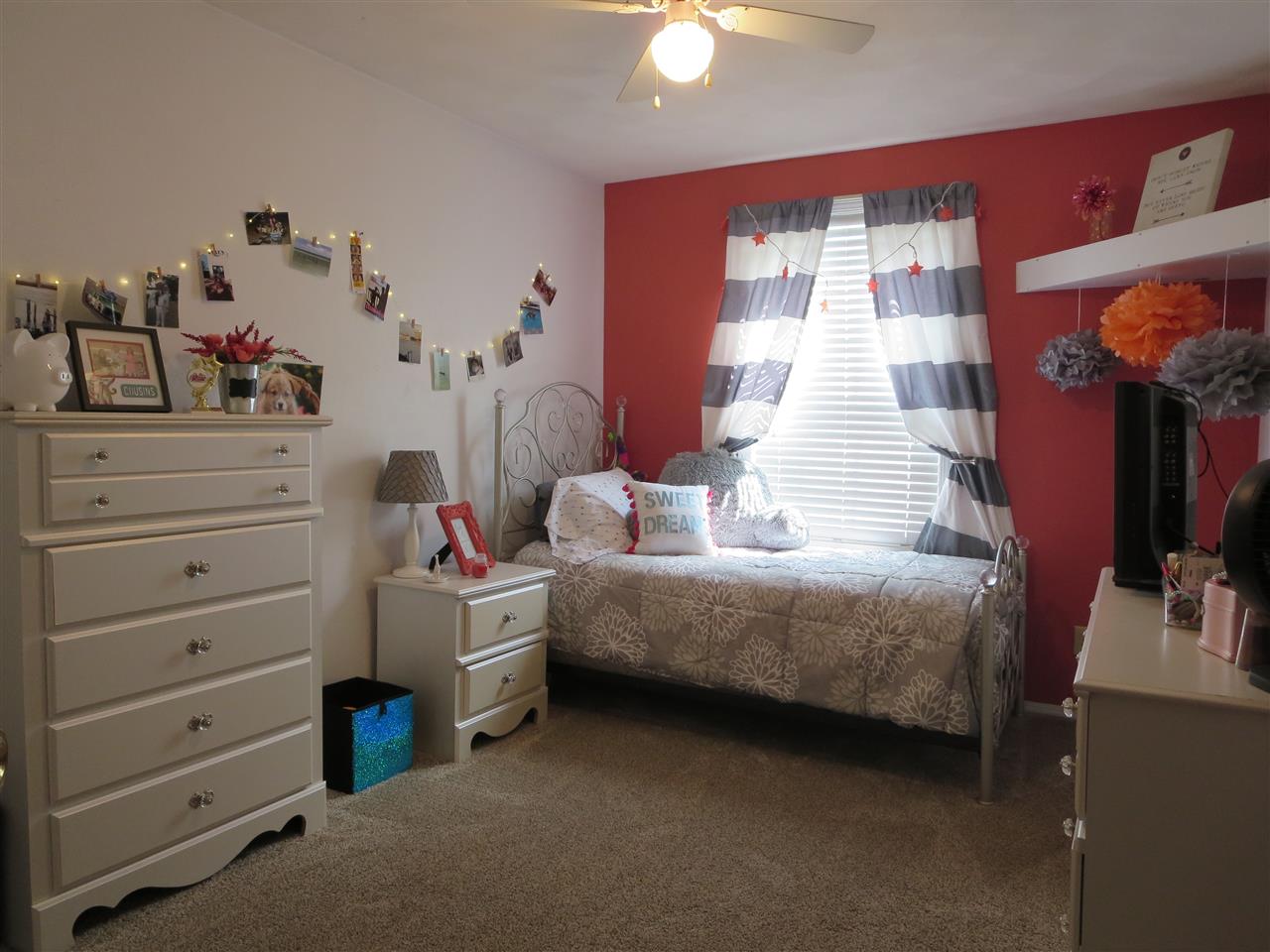 724 Bayfield Road Rockton, IL 61072 - Photo 14 of 22 a bedroom with a bed and a chandelier