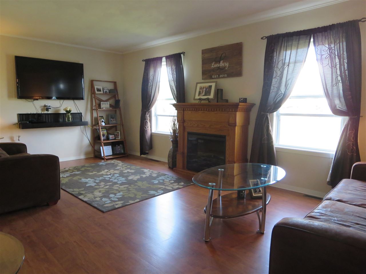 724 Bayfield Road Rockton, IL 61072 - Photo 3 of 22 a living room with furniture and a flat screen tv
