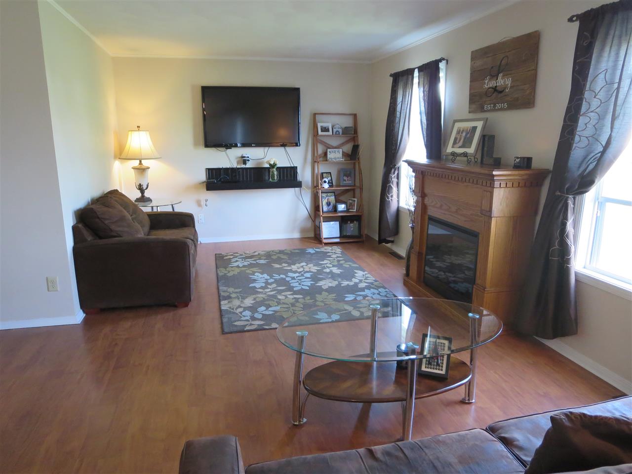 724 Bayfield Road Rockton, IL 61072 - Photo 4 of 22 a living room with furniture and a flat screen tv