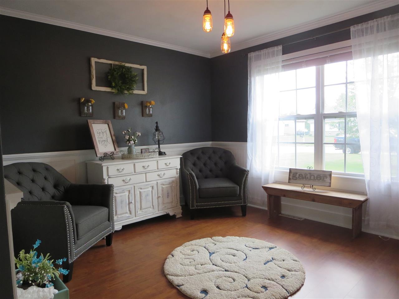 724 Bayfield Road Rockton, IL 61072 - Photo 8 of 22 a living room with furniture and a flat screen tv