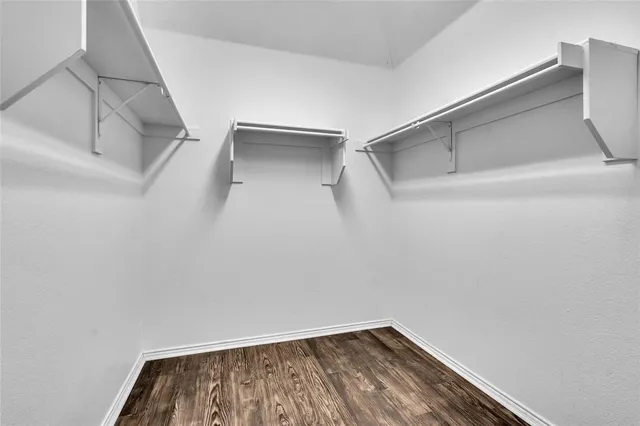 a view of small space with racks on the wall