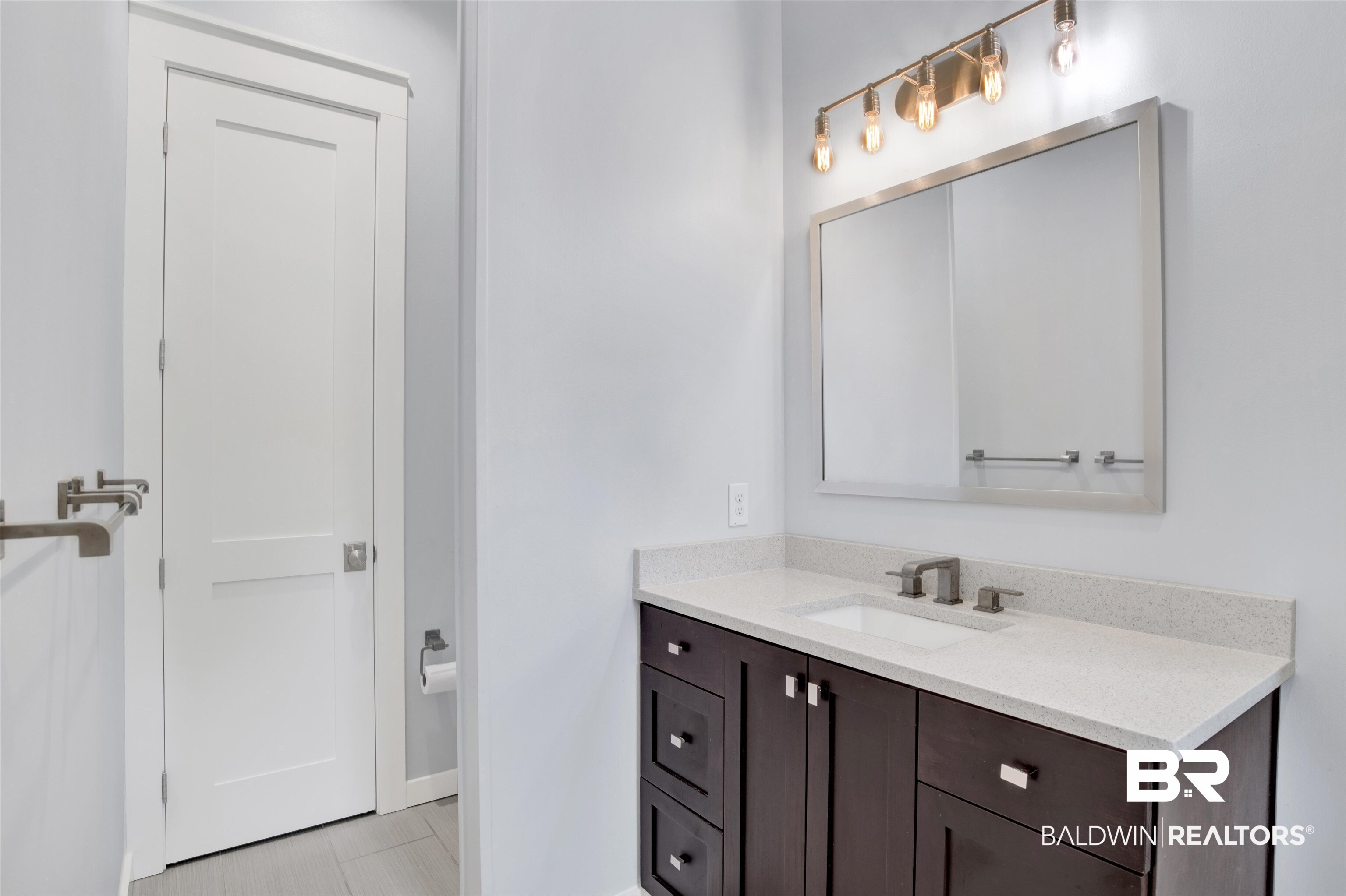 27980 Canal Road Orange Beach, AL 36561 - Photo 35 of 46 Bathroom with vanity and tile patterned floors