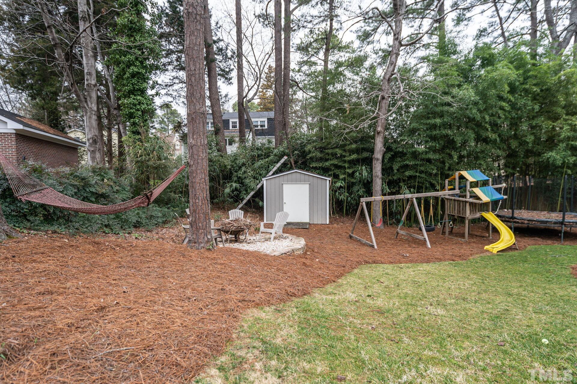 2204 West Charlotte Court Raleigh, NC 27607 - Photo 30 of 31 a view of a slide with a slide