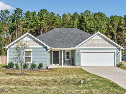 front view of a house and a yard