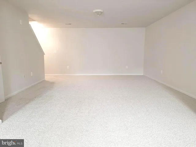 a swimming pool view with a outdoor seating space