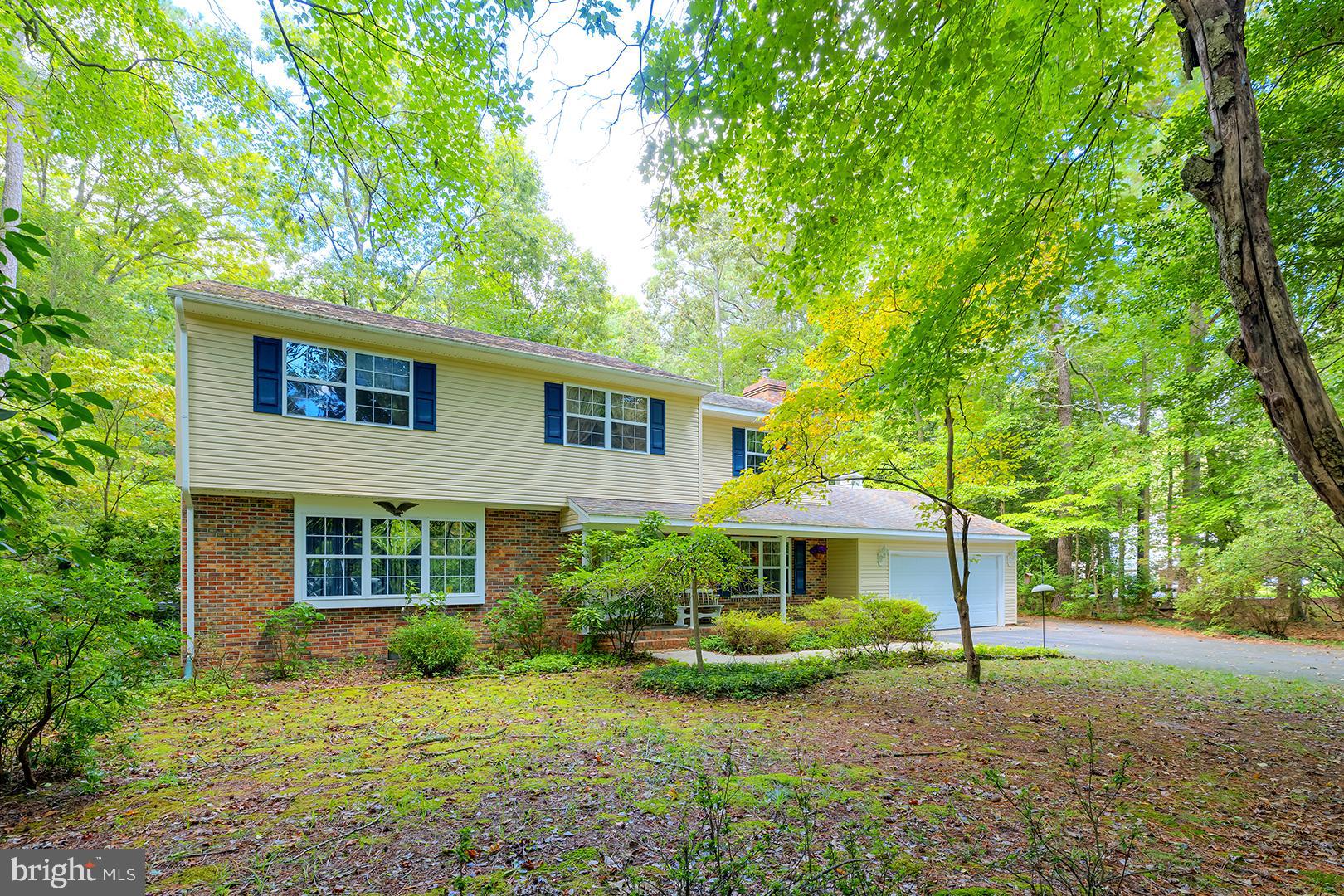 3910 5 Friars Road Salisbury, MD 21804 - Photo 1 of 45 a front view of a house with a yard and porch