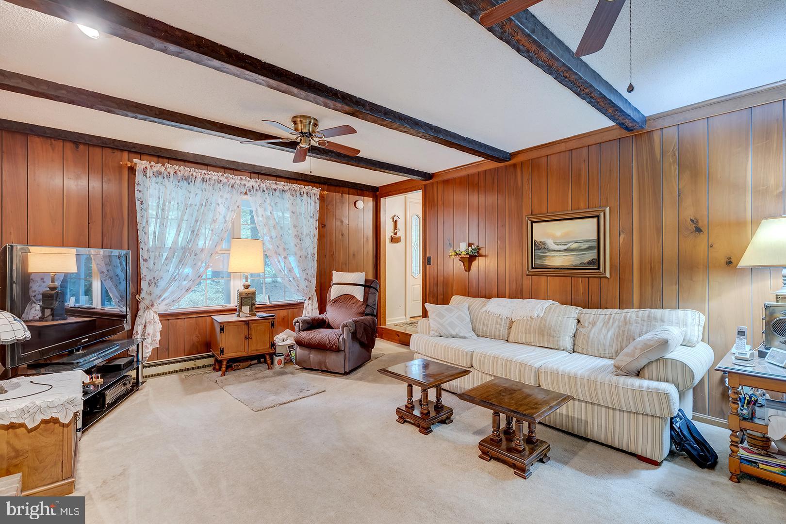 3910 5 Friars Road Salisbury, MD 21804 - Photo 20 of 45 a living room with furniture and a window