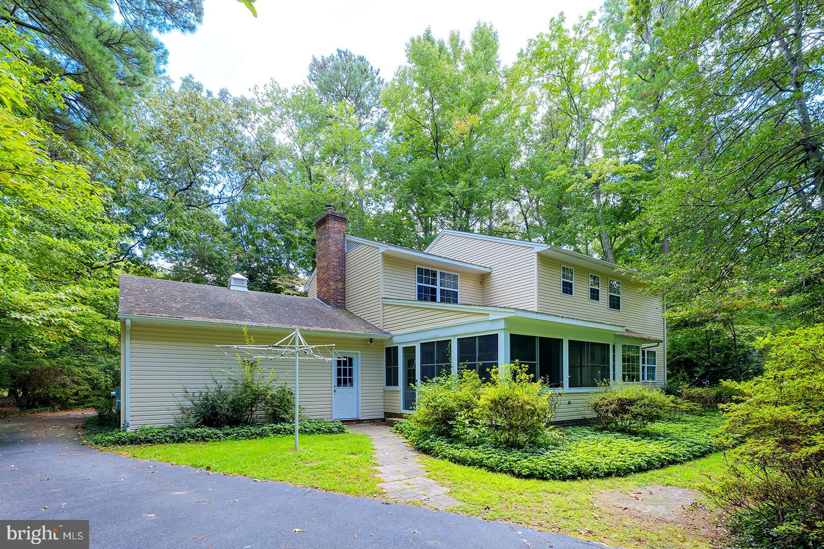 3910 5 Friars Road Salisbury, MD 21804 - Photo 42 of 45 a front view of a house with garden and porch