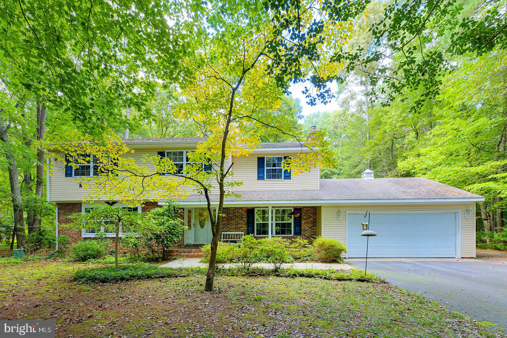 3910 5 Friars Road Salisbury, MD 21804 - Photo 44 of 45 a front view of a house with garden