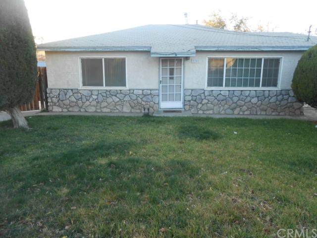 5942 Chadbourne Avenue Riverside, CA 92505 - Photo 1 of 1 a front view of a house with garden