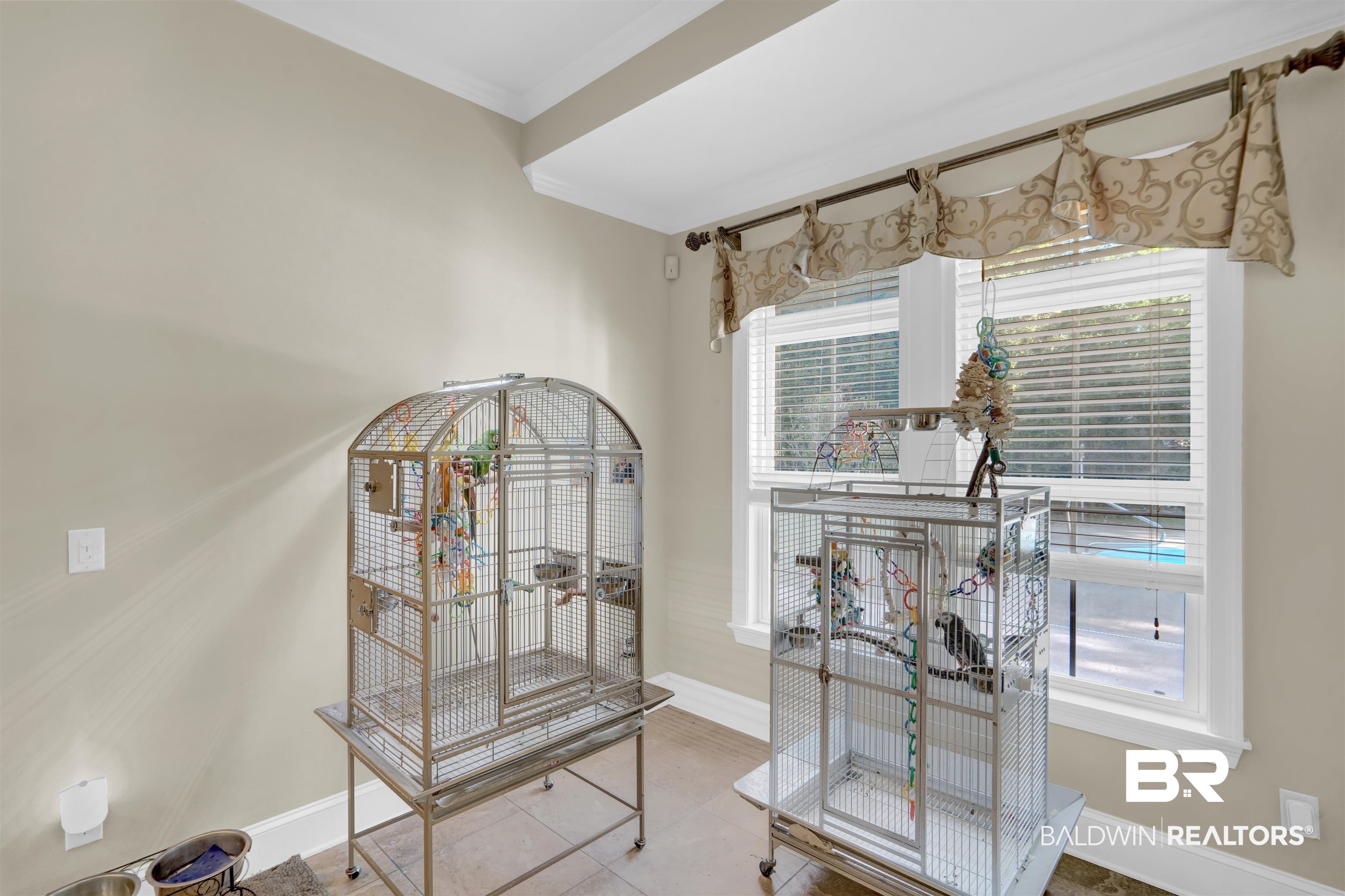 10951 Driver Court Fairhope, AL 36532 - Photo 23 of 46 Interior space featuring crown molding and tile patterned flooring