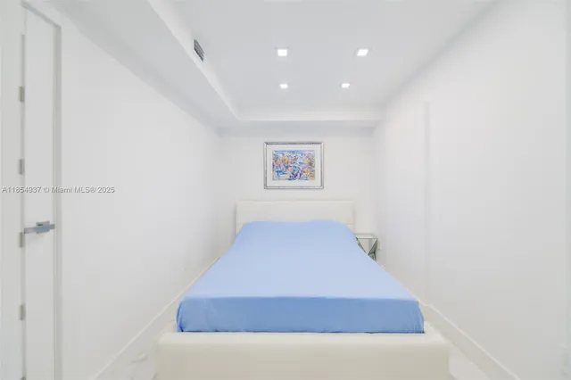 a view of a hallway with staircase