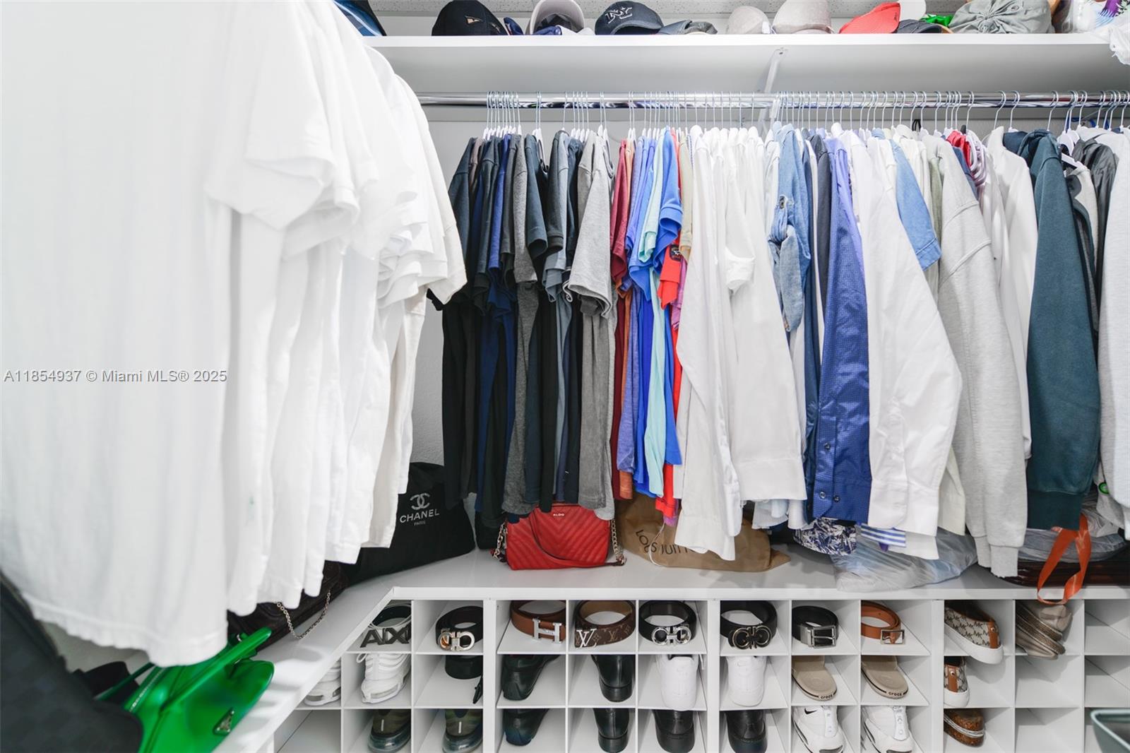 1980 South Ocean Drive, Unit PHM Hallandale Beach, FL 33009 - Photo 14 of 18 a view of walk in closet with clothes