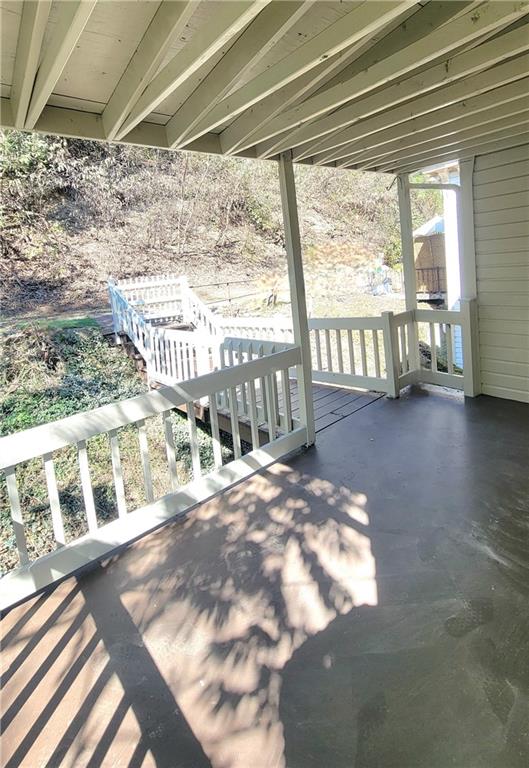 1003 Middle Glenshaw, PA 15116 - Photo 2 of 15 a view of a porch with a bench in wooden floor